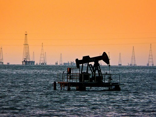 Oil rigs in Lake Maracaibo at sunset